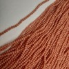 Czech Crystal Beads, Peach Faceted Rondelle, Diameter 3.5x3mm+-, Length 38mm+- on Fishing Line
