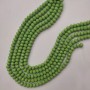 Czech Crystal Beads Lime Green Faceted Rondelle, Diameter 8x6mm+-, Length 40mm+- on Fishing Line