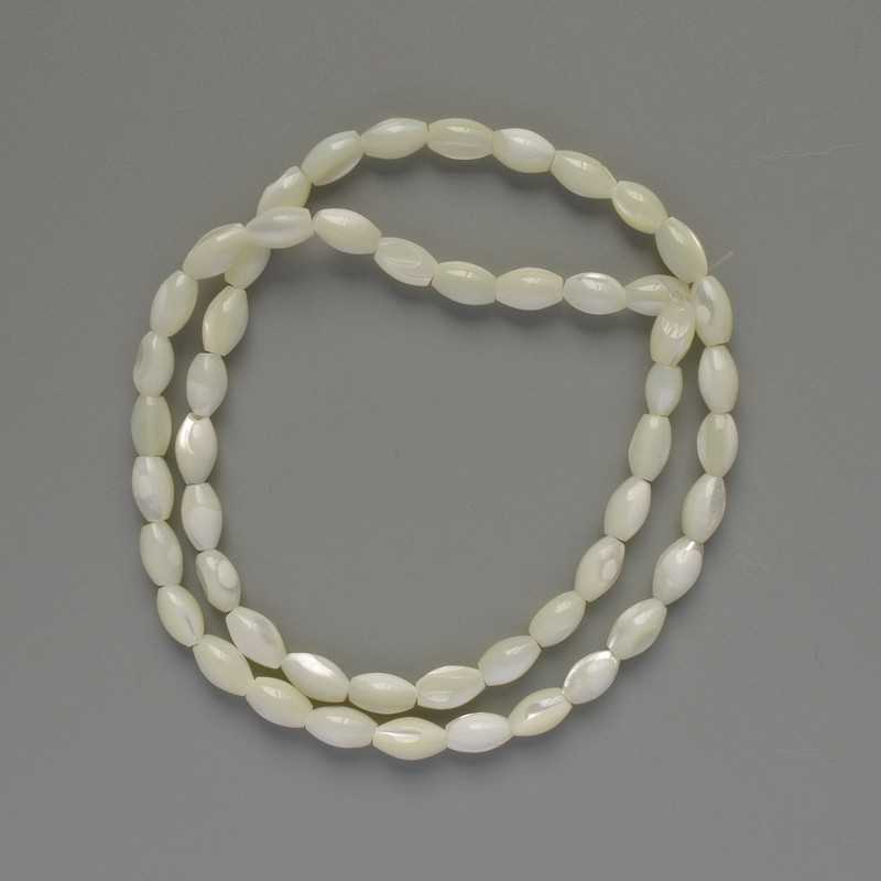 Mother-of-Pearl Beads Grain Shape, diameter 5.5x9mm +/-, length 39cm +/- on nylon thread