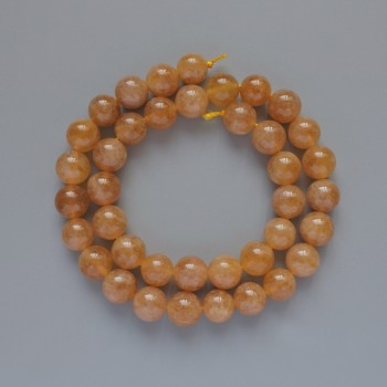 Calcite Beads, smooth round, diameter 10mm+/-, length 39cm+/- on a thread