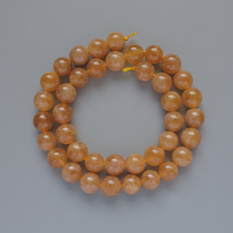 Calcite Beads, smooth round, diameter 10mm+/-, length 39cm+/- on a thread