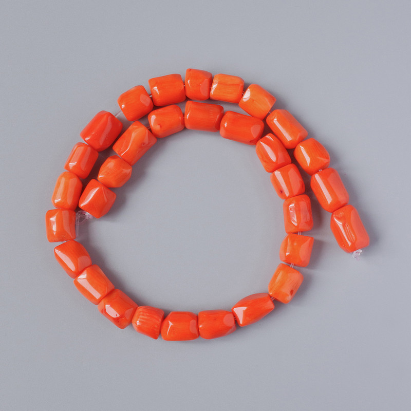 Coral Beads Orange Natural Tumbled, diameter 12x9mm +/-, length 40cm +/- on fishing line