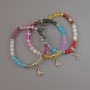 Assorted Bracelet, smooth round bead, diameter 6.5mm+-, length 18cm+- (stretch) with metal spacers