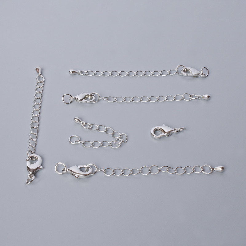Clasp lobster with extender chain, diameter 12x6mm, length 5.5cm, silver coloured metal, 1 piece