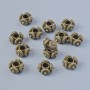 Bead findings insert, diameter 7.5×4 mm, bore diameter 2.6 mm, pack 13+ bronzed metal colour