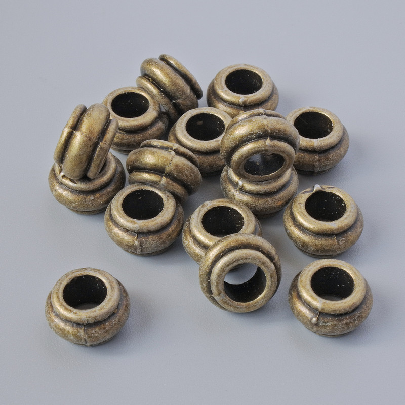 Finding Insert Bead, diameter 9x5.5mm, hole diameter 4.7mm, pack 16pcs+/- bronze colour metal