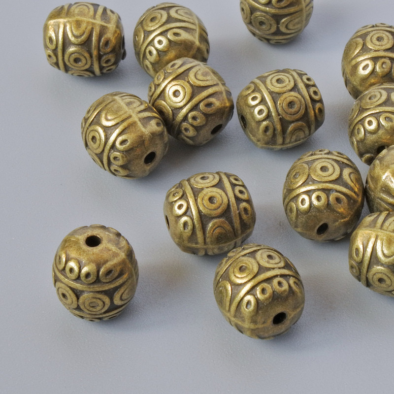 Finding Insert Bead, diameter 7.5x7mm, hole diameter 1.2mm, pack 14pcs+/- bronze colour metal