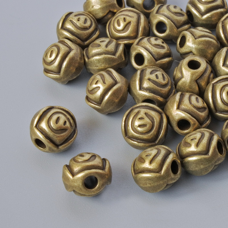 Findings bead insert "Rose", diameter 7x6.5mm, hole diameter 2mm, pack 28pcs+/- bronze colour metal