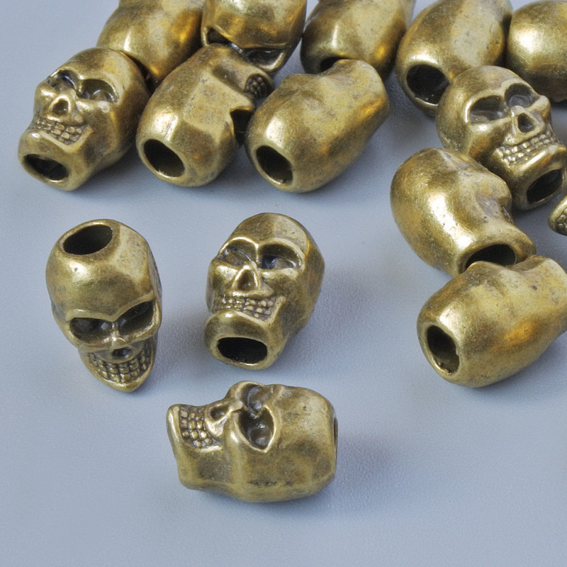 Findings bead insert "Skull", diameter 9x6mm, hole diameter 2.6mm, pack 18pcs+/- bronze colour metal