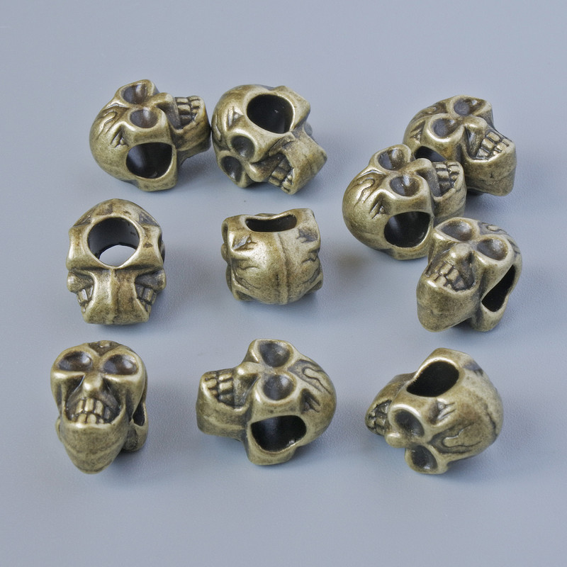 Findings bead insert "Skull", diameter 12x8x9mm, hole diameter 4.5mm, pack 10pcs+/- bronze colour metal