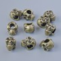 Findings bead insert "Skull", diameter 12x8x9mm, hole diameter 4.5mm, pack 10pcs+/- bronze colour metal