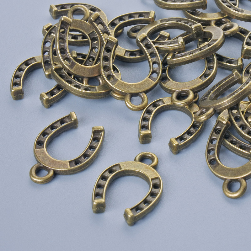 Findings pendant "Horseshoe", diameter 15x11mm, hole diameter 1.9mm, pack 24pcs+/- bronze colour metal