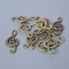 Findings pendant "Treble Clef", diameter 33x14.5mm, hole diameter 5.5x2mm, pack 11pcs+/- bronze colour metal