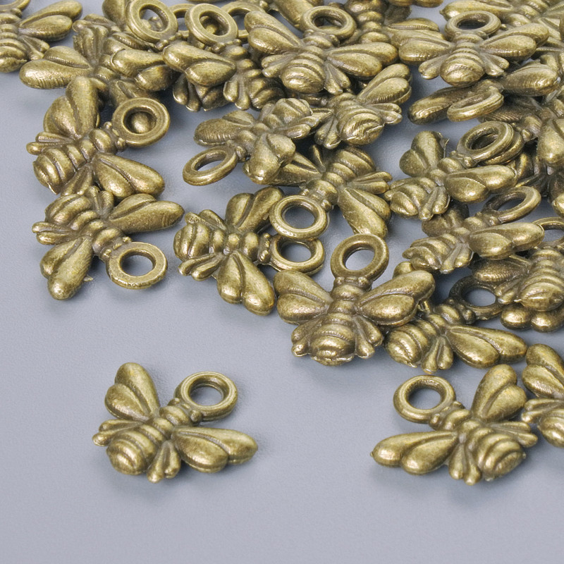 Pendant findings "Bee", diameter 10x11mm, hole diameter 1.9mm, packaging 33 pcs ±, bronze colour of metal
