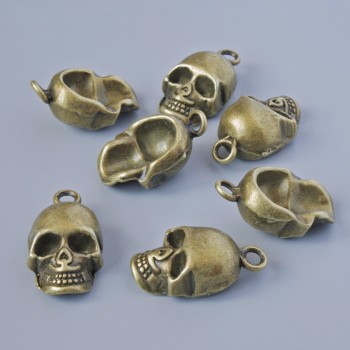 Finding Pendant "Skull", 20x11x7.5mm, hole diameter 2.1mm, pack of 7pcs+/- bronze metal colour