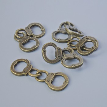 Finding Pendant "Handcuffs", 17x11.5mm, length 31mm, pack of 5pcs+/- bronze metal colour