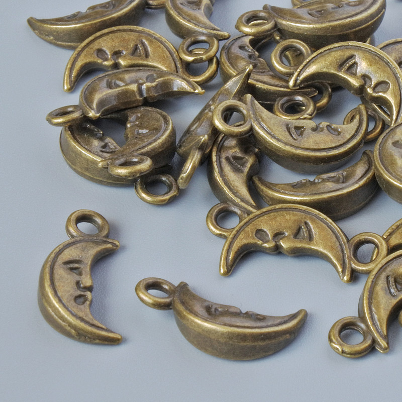 Finding Pendant "Moon", diameter 13x6.5mm, hole diameter 1.6mm, pack of 20g+/- 40pcs+/- bronze metal colour