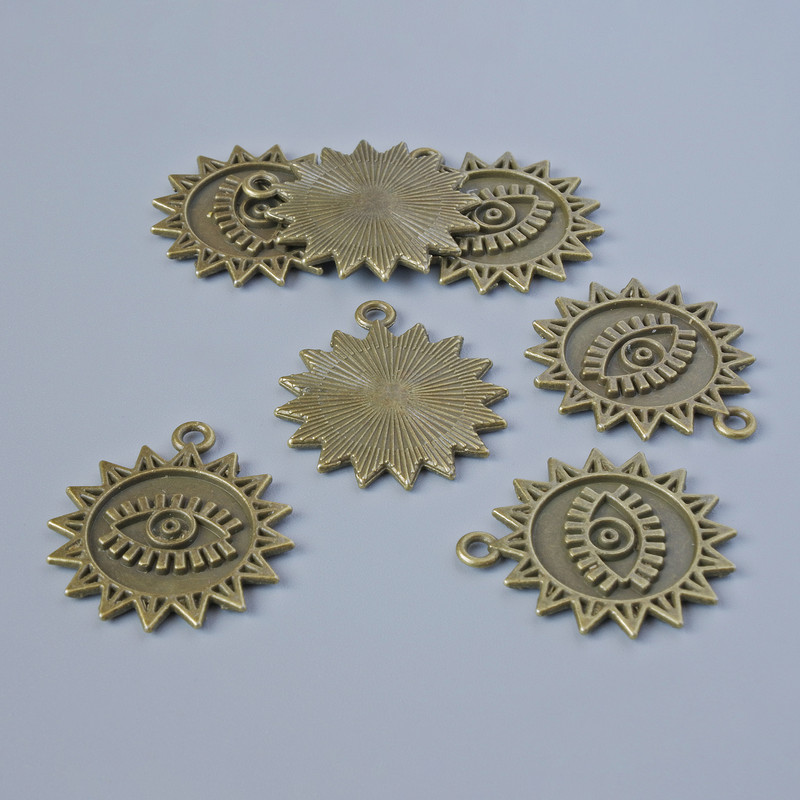 Finding Pendant "Sun", diameter 21.5x19mm, hole diameter 1.6mm, pack of 7pcs +/- bronze metal colour