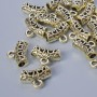Bead Bail Holder, 13.5×5 mm, hole diameter 2–2.7 mm, length 9 mm, packaged 19 pcs ± 20 g, light gold colour metal