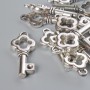 Finishing hardware Pendant Key 25x11mm polished, 12 pcs ± 20 g, silver-tone metal