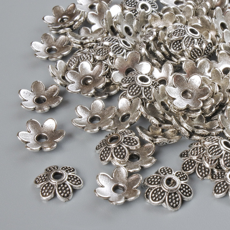 End caps, diameter 7x2 mm, hole diameter 1.5 mm, packaging 20 g (+- 100 pcs) silver metal colour
