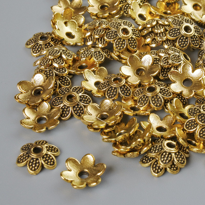 End caps, diameter 7×2 mm, bore diameter 1.5 mm, packaging 20 g ±, golden metal colour ~120 pcs