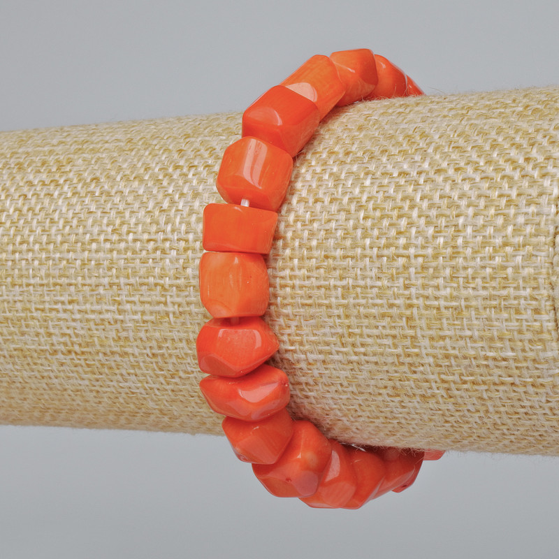 Bracelet Coral, orange, natural faceted bead (assorted, medium size), diameter 12x9mm, length 18cm± (stretch)