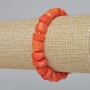Bracelet Coral, orange, natural faceted bead (assorted, medium size), diameter 12x9mm, length 18cm± (stretch)
