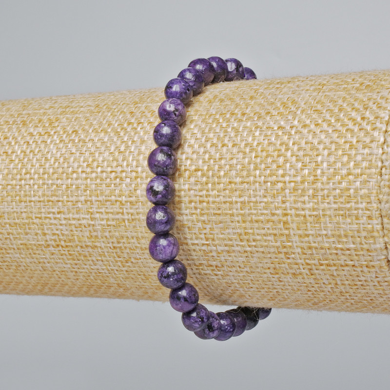 Sugilite Bracelet (faceted) smooth beads, diameter 6.5mm ±, length 18cm ± (stretch)