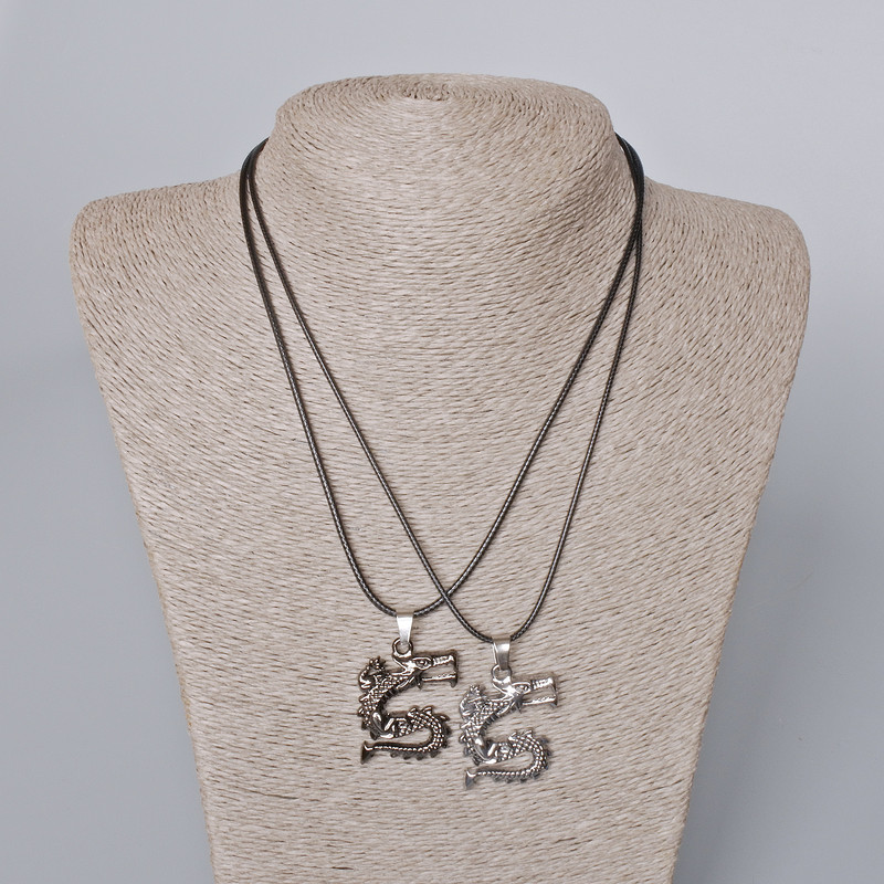 Matching Pendants "Dragon" black enamel and silver metal 33x26mm +/-, length 45-50cm+