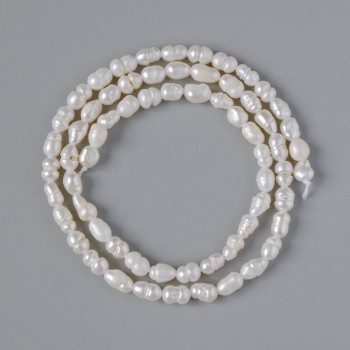 Freshwater pearls (relief) on a thread, diameter 3.5–5 mm, length 33 cm ±