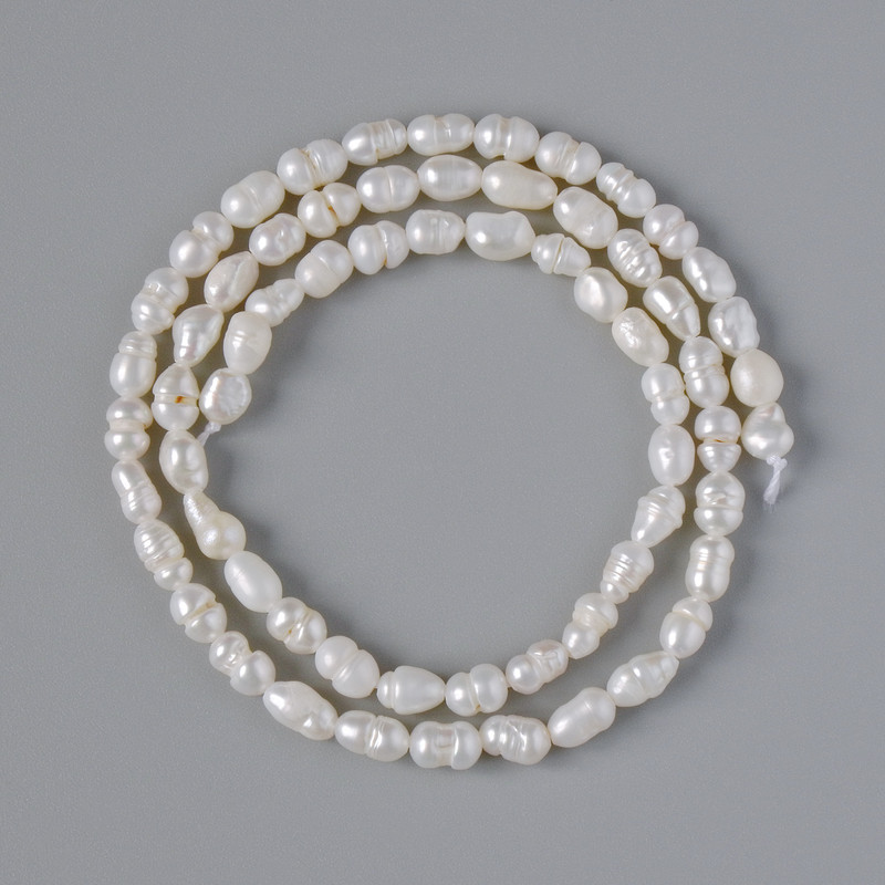 Freshwater pearls (relief) on a thread, diameter 3.5–5 mm, length 33 cm ±