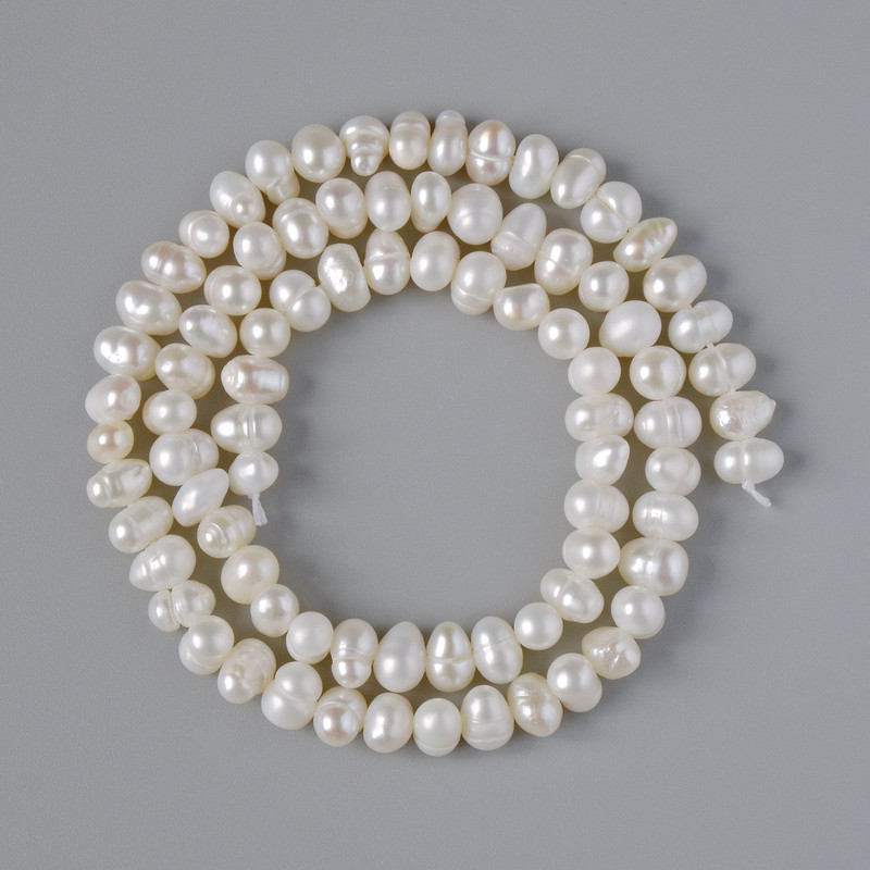 Textured River Pearl Beads, diameter 6x4.5mm+/-, length 35cm+/- on a thread