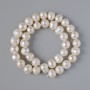Textured River Pearl Beads, diameter 9.5x8.5mm+/-, length 35cm+/- on a thread