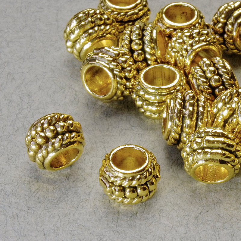 Findings Spacer Bead, diameter 8.5x6mm+/-, hole diameter 4.5mm, gold-coloured metal, pack 20g+/- 26pcs+