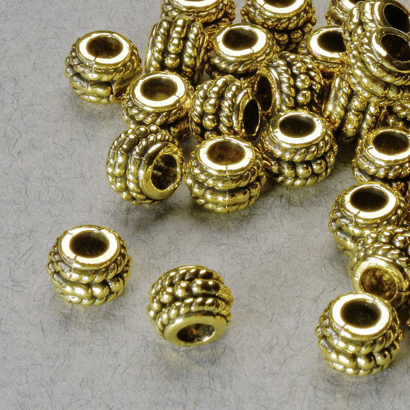 Findings Spacer Bead, diameter 5x6.5mm+/-, hole diameter 2.8mm, gold-coloured metal, pack 20g+/- 38pcs+