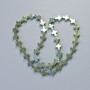 Hematite Beads "Cross" green-blue colour, diameter 8.5x10.5x3mm+/-, length 40cm+/- on thread