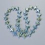 Hematite Beads "Cross" green-blue colour, diameter 12.5x12.5x4mm+/-, length 40cm+/- on thread