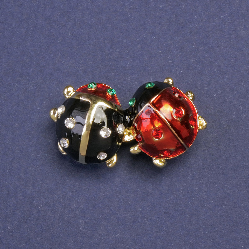 Brooch 'Ladybug' with red and black enamel on gold-tone metal 15x28mm
