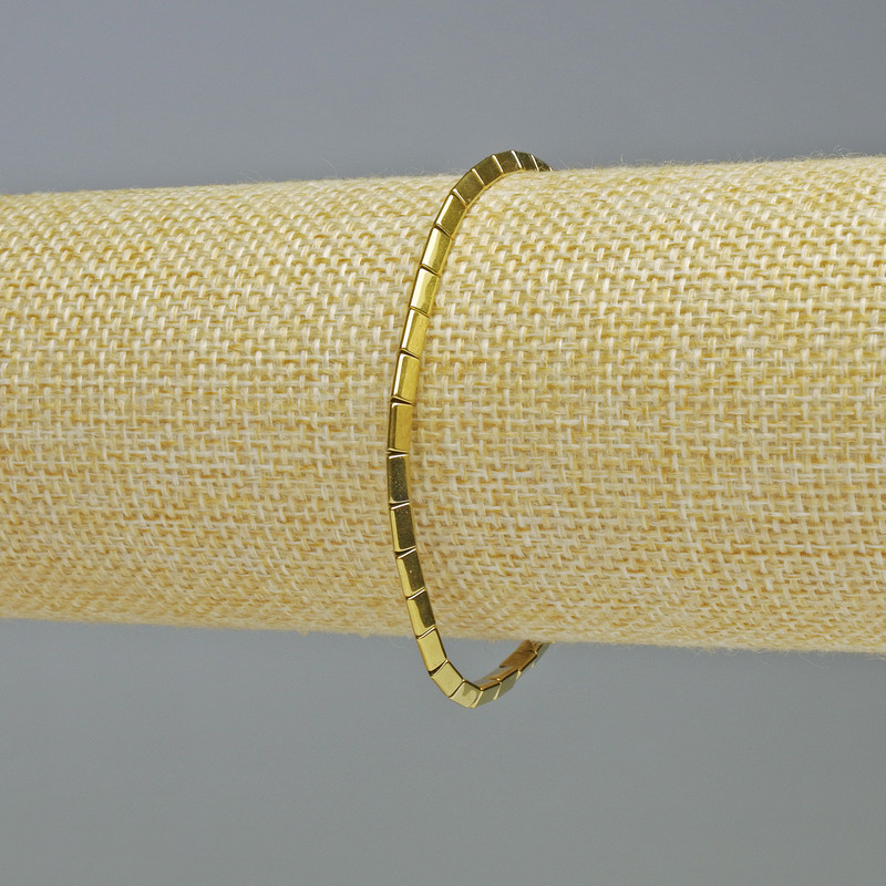 Bracelet Hematite Triangle Gold Colour, diameter 5x2mm+-, length 18cm+- stretch