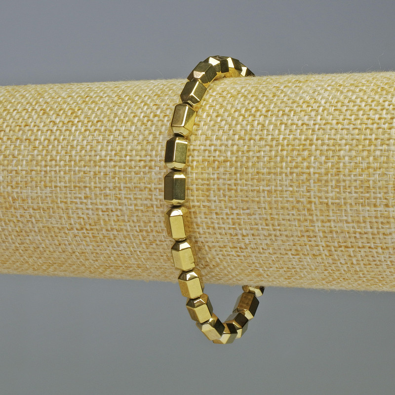 Hematite Bracelet Hexagons Gold Colour, diameter 5x8mm+/-, length 18cm+/- stretch