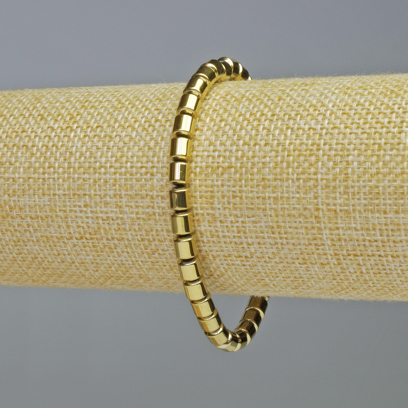 Hematite Bracelet Cylinder Gold Colour, Diameter 5x5mm+-, Length 18cm+- Stretch