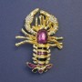 Brooch Omar purple and black enamel on gold-tone metal 58x43mm