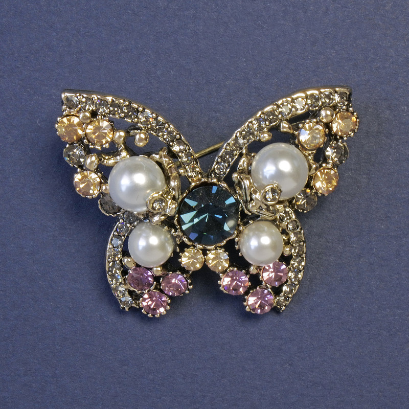 Brooch Butterfly with White Pearls and Pink, Blue and Gray Rhinestones 32x42mm Silver Metal