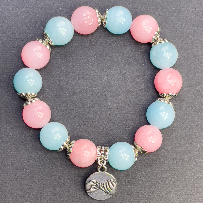 Bracelet Assorted smooth acrylic bead, diameter 12mm+- with metal inserts, length 18cm+- stretch