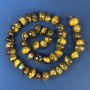 Tiger's Eye Beads, tumbled 11x10mm+/-, on a thread, length 40cm+