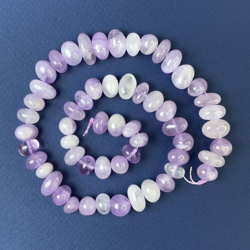 Amethyst Beads, tumbled 10-13x6mm+/-, on a thread, length 40cm+