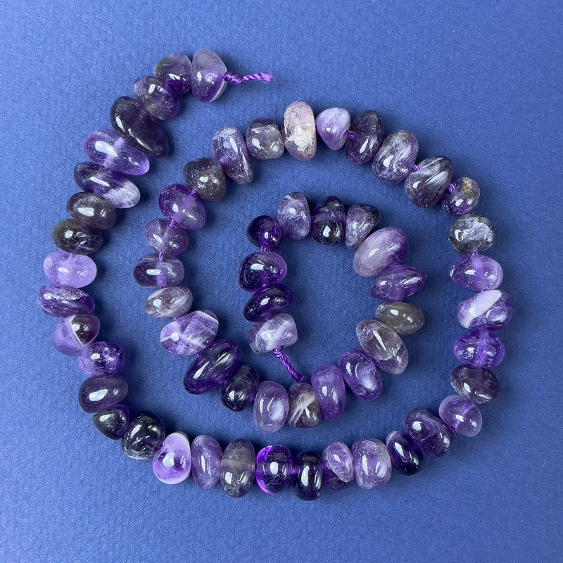 Amethyst Tumbled Beads 10x6mm+- on a String, length 38cm+