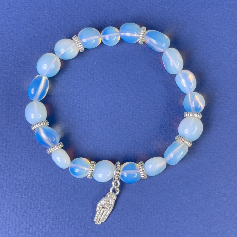 Moonstone Bracelet, tumbled, diameter 9-12x9mm+- rondelle 8x5mm+- with metal inserts, length 18cm+- stretch