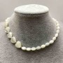 Choker Mother-of-Pearl Grains, size 5.5x9mm+-, heart 12x12x4mm+, gold-toned metal, length 35-40cm+- with extension chain